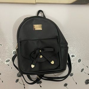 Brand new black backpack.